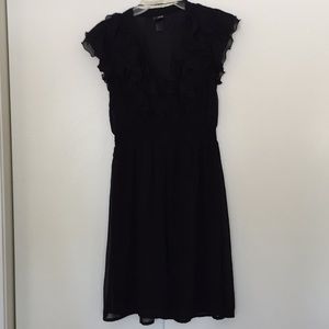Black sleeveless ruffled neck dress size 8
